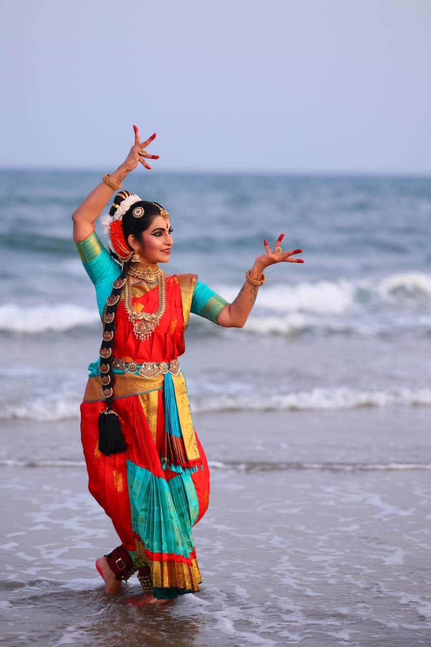 Pooja Raj in a Bharatanatyam pose by the sea