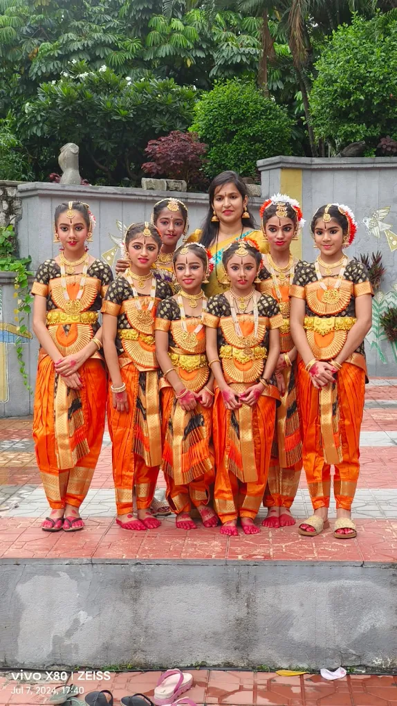 Young students in full Bharatanatyam costume